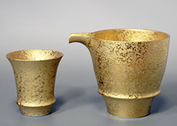 Japanese pottery Arita sake cup and a katakuchi sake pourer